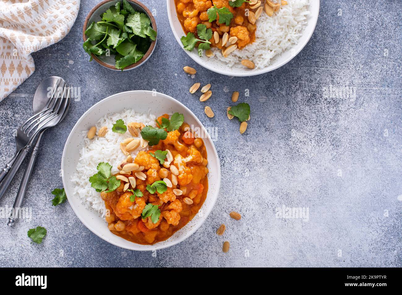 Vegan curry with cauliflower, chickpeas and butternut squash Stock Photo