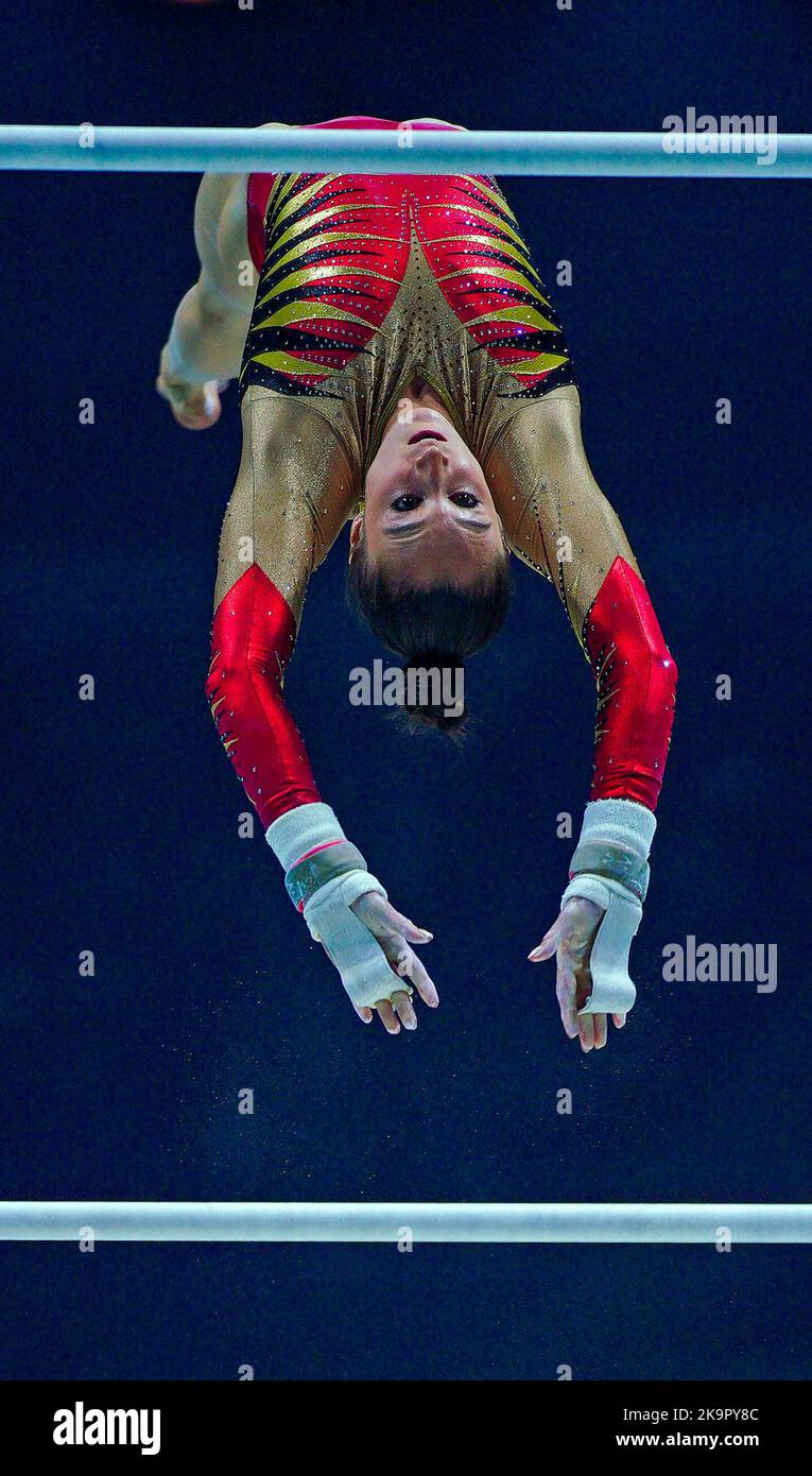 Belgium's Nina Derwael competes on the asymmetrical bars during day one