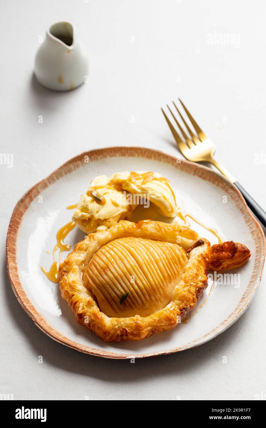 Hasselback pear in puff pastry fresh from the oven Stock Photo