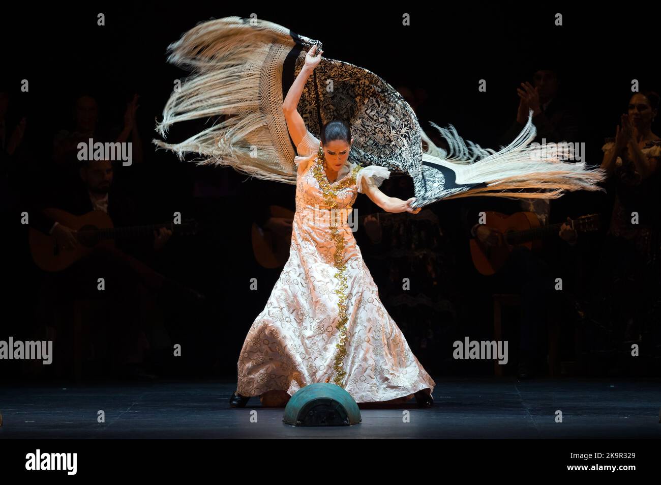 A dancer wearing a shawl performs on the stage during the first night of 'La Bella Otero' ballet