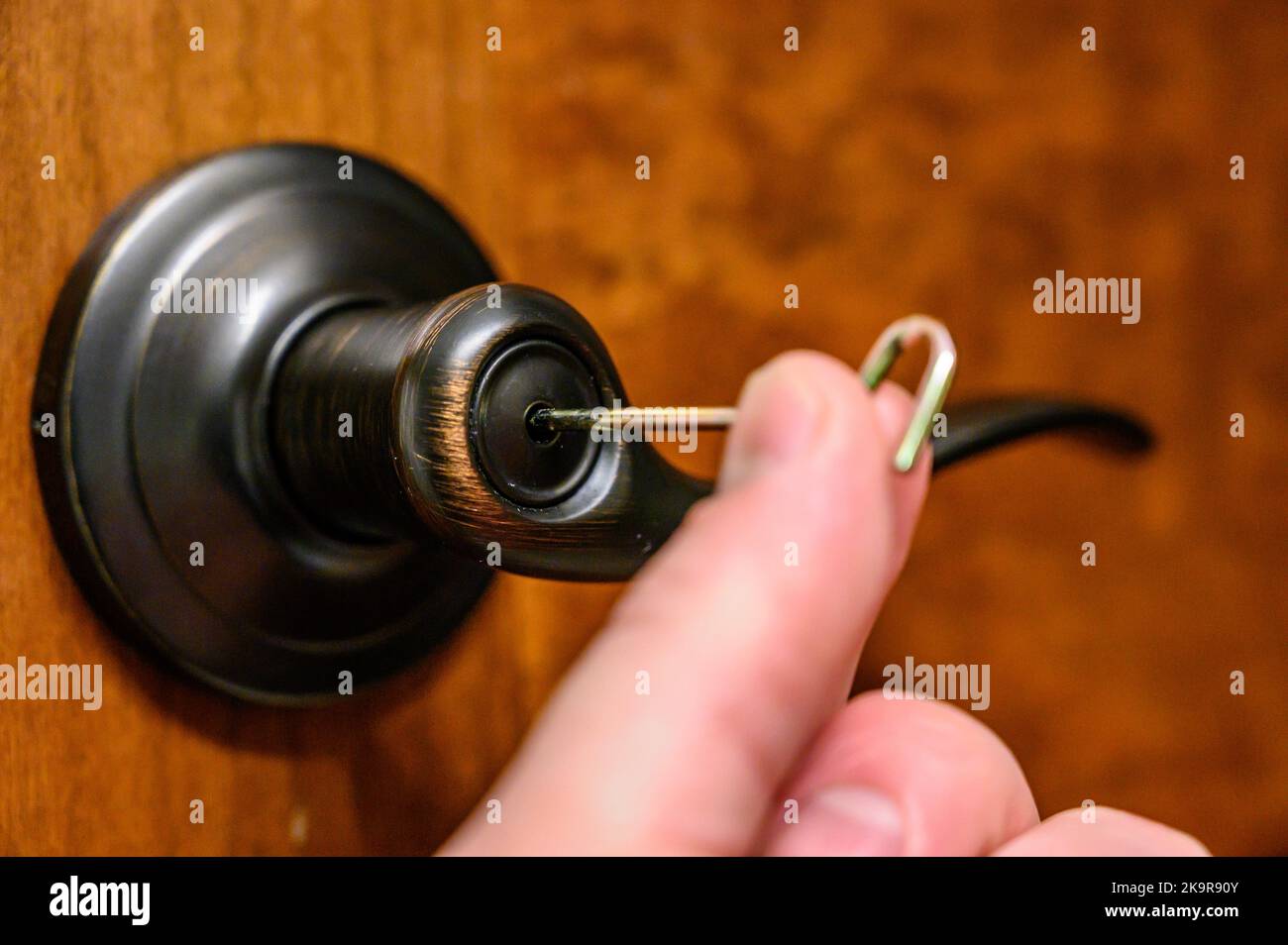 Oiled brass interior bedroom door handle with unlocking pin Stock Photo Alamy
