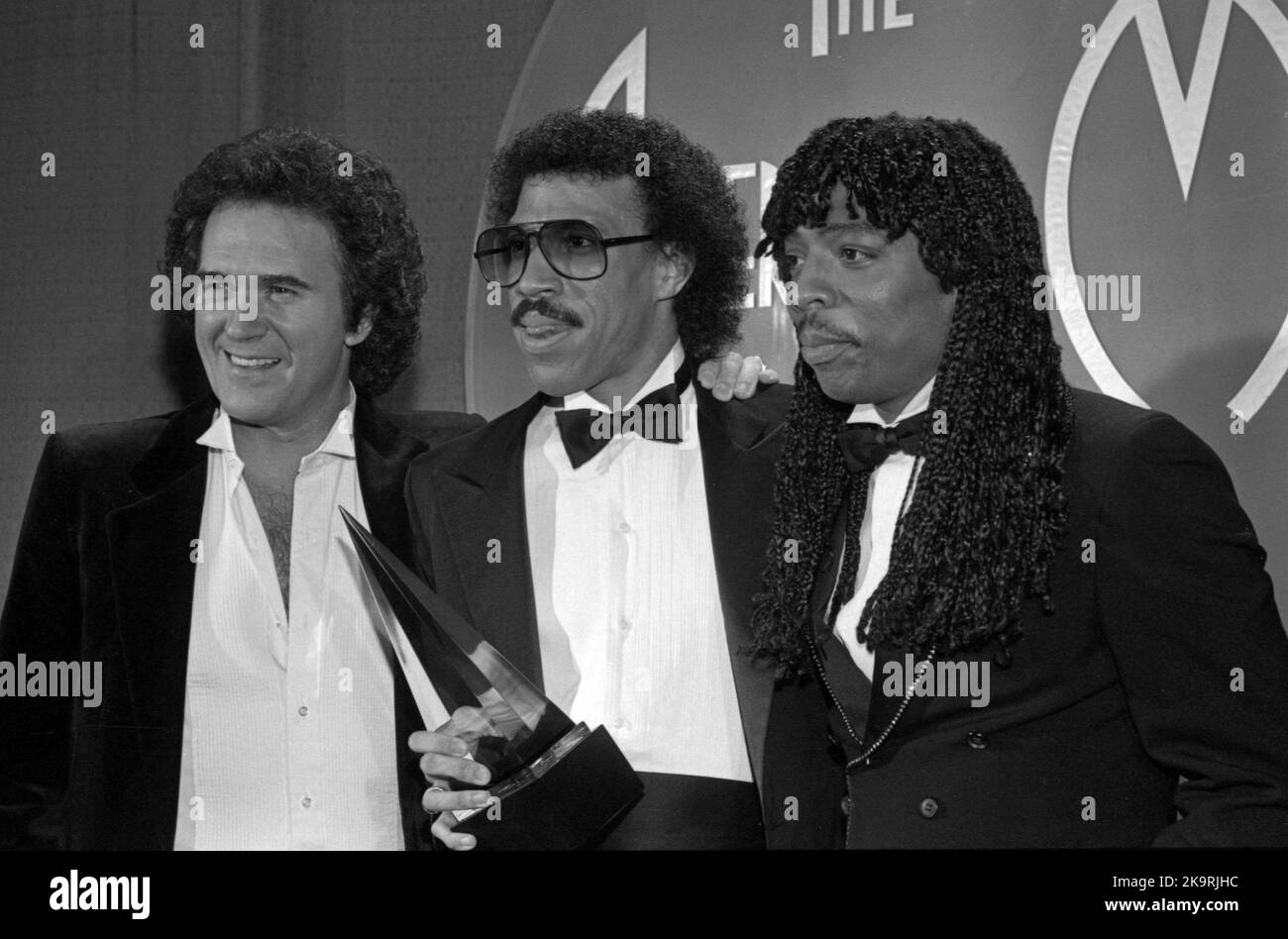 Lionel Richie with T.G. Shepherd and Rick James at the 10th Annual American Music Awards January 17, 1983 Credit: Ralph Dominguez/MediaPunch Stock Photo