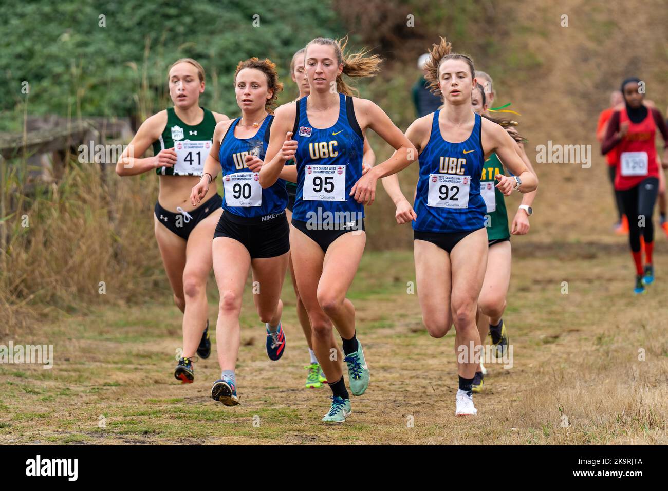 Abbotsford, Canada. 29th Oct, 2022. Pictured left to right, Kyla Becker, Jamie Hennessey, and Mackenzie Campbell of UBC Thunderbirds compete in Women's race at 2022 Canada West Cross Country Championships. Credit: Zhengmu Wang/Alamy Live News Stock Photo