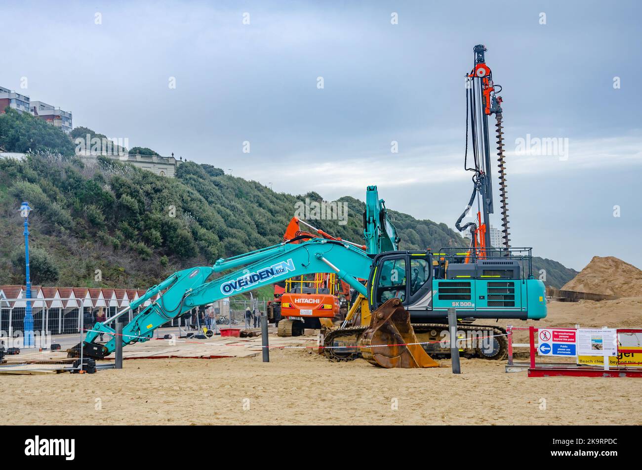 Heavy machinery on the beach at bournemouth in Dorset UK as the beach is closed to allow groins to be replaced. Stock Photo