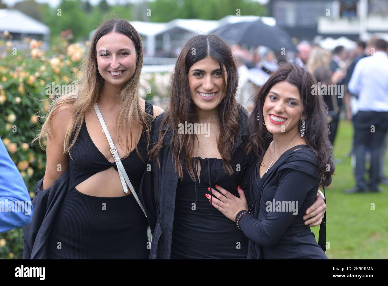 Jockeys and people take part during Melbourne Cup Carnival 2022 at
