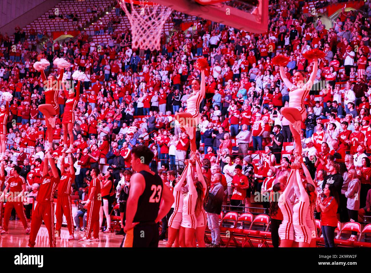 Bloomington, USA. 29th Oct, 2022. Indiana University cheerleaders cheer during introductions before the Hoosiers play Marian University against during an NCAA men's basketball exhibition game, at Assembly Hall in Bloomington. IU beat Marian 78-42. Credit: SOPA Images Limited/Alamy Live News Stock Photo