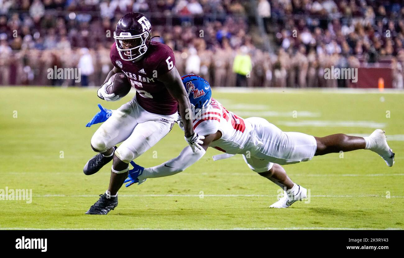College Station, Texas, U.S.A. 29th Oct, 2022. October 29, 2022- College Station, Texas U.S.A - Texas A&M DEVON ACHANE (6) eludes a Ole Miss defender during the game between the Ole Miss Rebels and the Texas A&M Aggies at Kyle Field in College Station, Texas. (Credit Image: © Jerome Hicks/ZUMA Press Wire) Credit: ZUMA Press, Inc./Alamy Live News Stock Photo