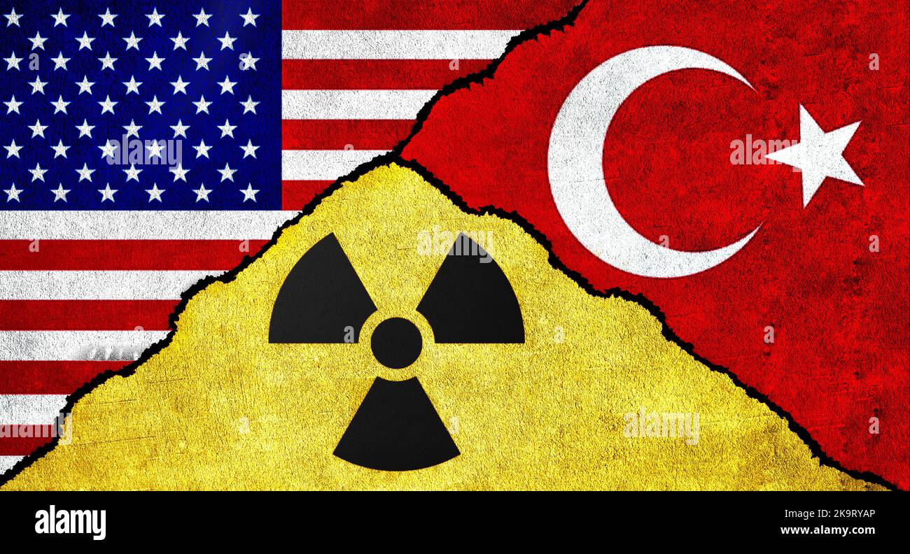 Flags of USA, Turkey and Nuclear symbol together. United States of America and Turkey Nuclear Deal or Agreement concept Stock Photo