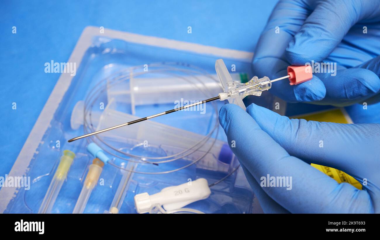 Needle for anesthesia in the hands of a doctor. Tuohy Epidural Needle