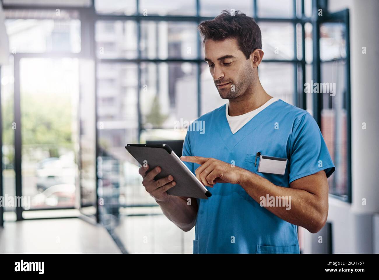 Evaluating the patients health. a young handsome male medical