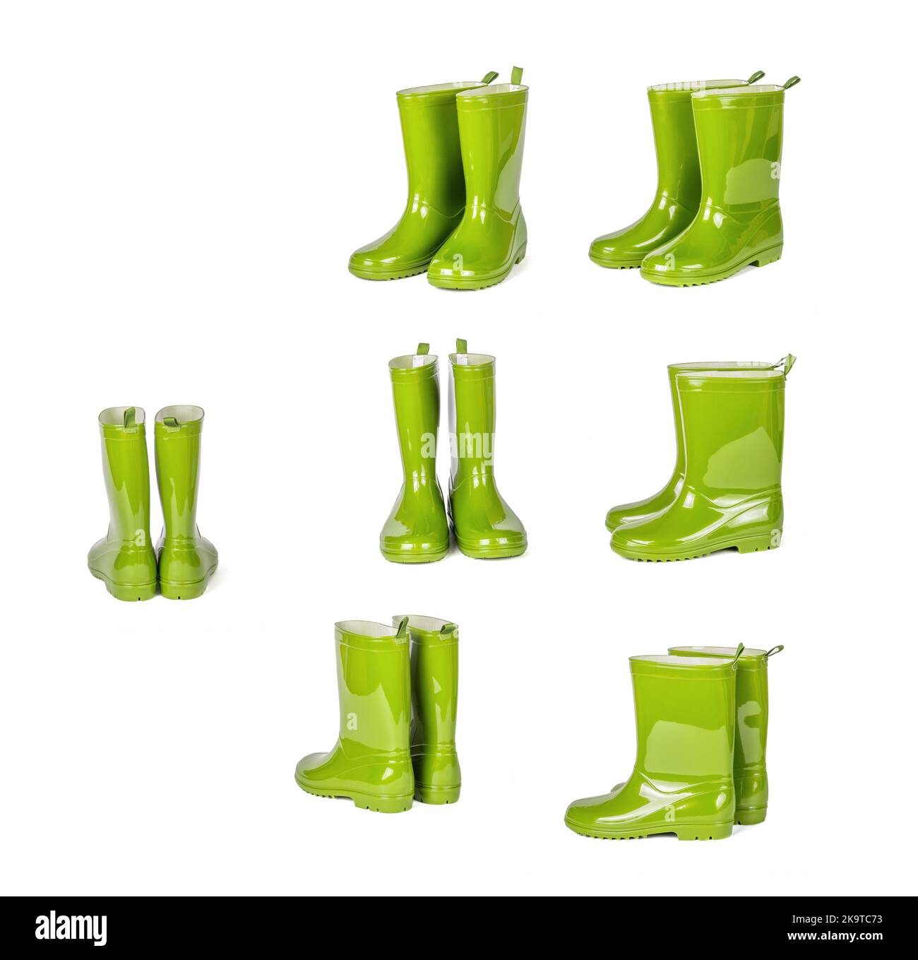 Set of green rubber boots isolated on white background. Stock Photo
