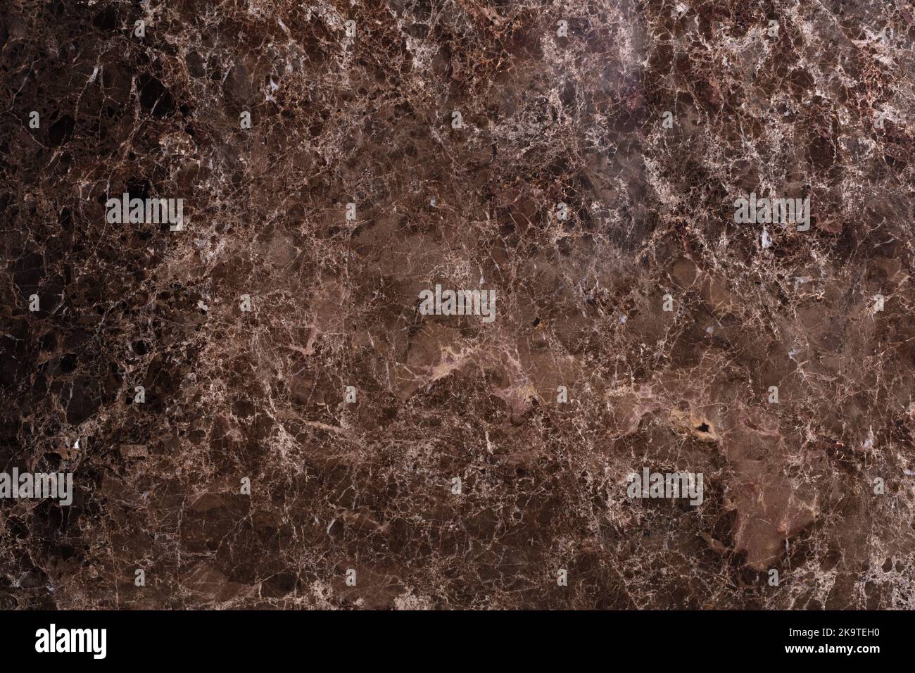 Emperador dark - natural marble stone texture, photo of slab. Brown matt Italian stone pattern, background for interior, exterior home decoration Stock Photo