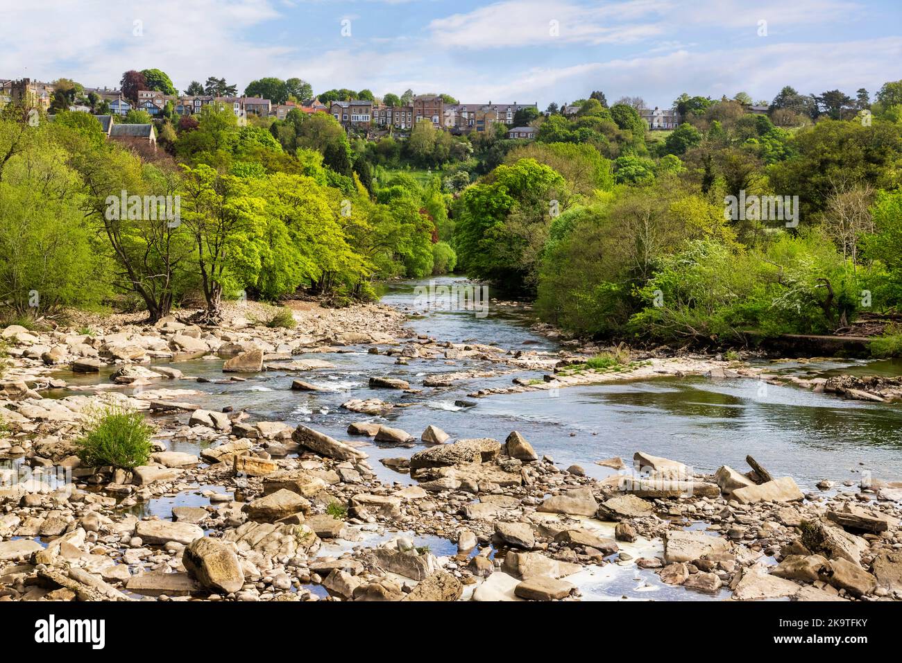 The River Swale winding through its valley at Richmond, North Yorkshire, and the upper town. Stock Photo
