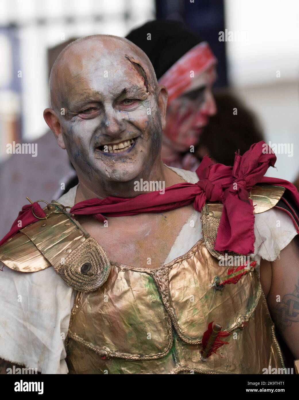 Terrifying Halloween flash mob arrive outside Eastbourne's famous pier to dance to amused, surprised and a little scared tourists and passers by Stock Photo