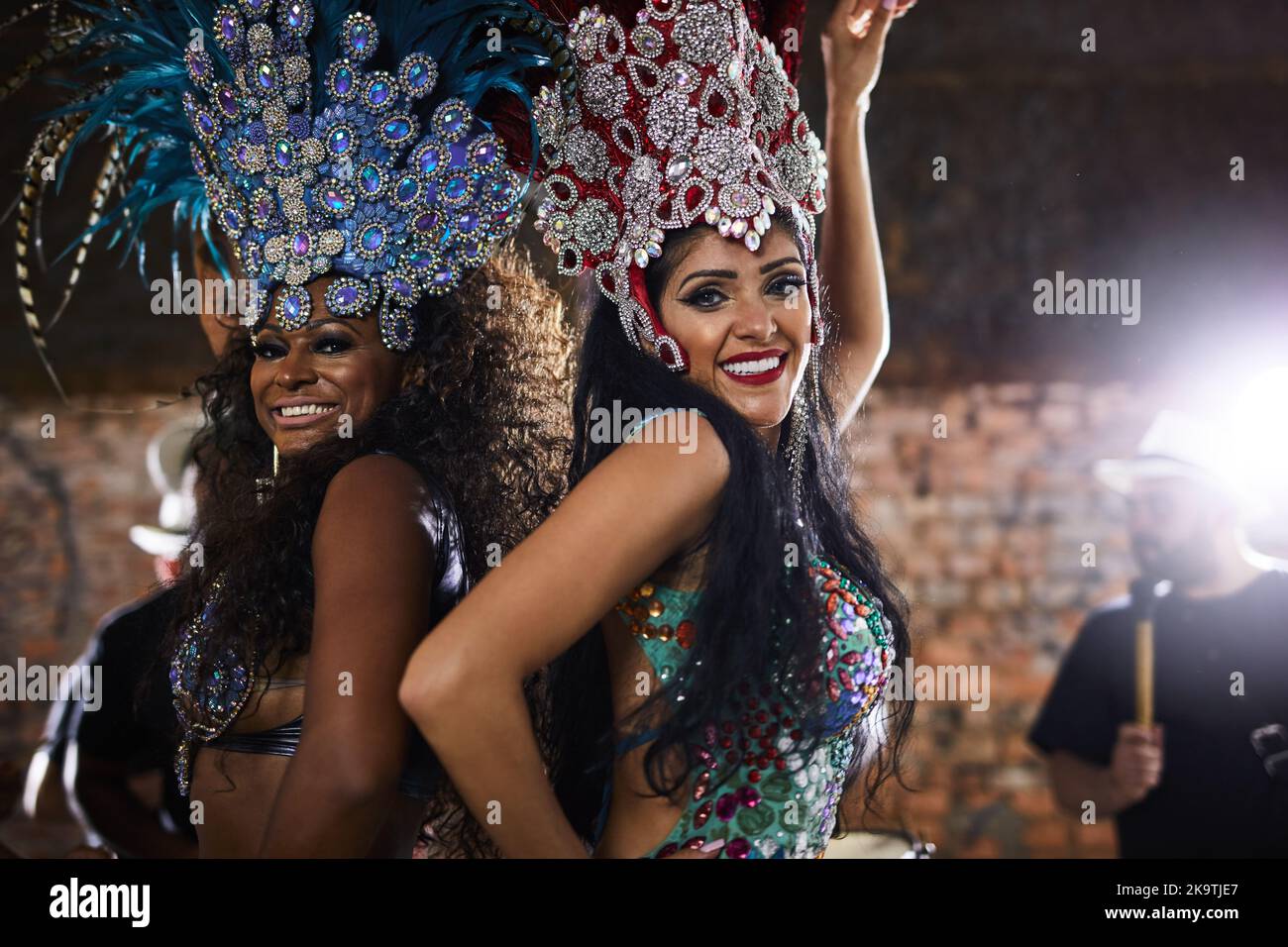The evening is all ours. Portrait of samba dancers performing in a ...
