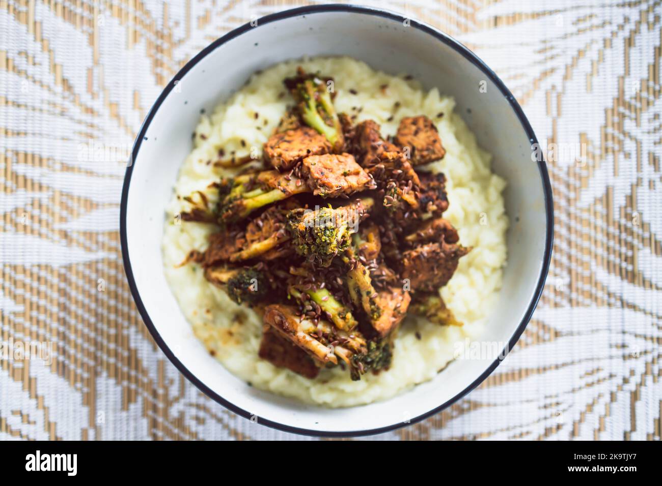 plantbased marinated tempeh and broccoli with coconut rice, healthy