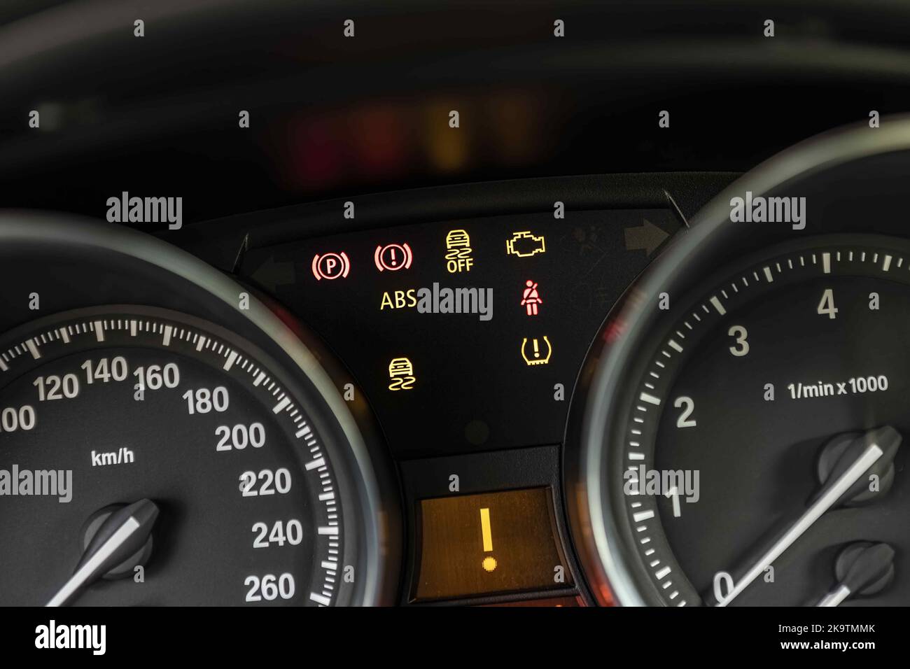 Car warning lights in the dashboard. Car service evocative image Stock