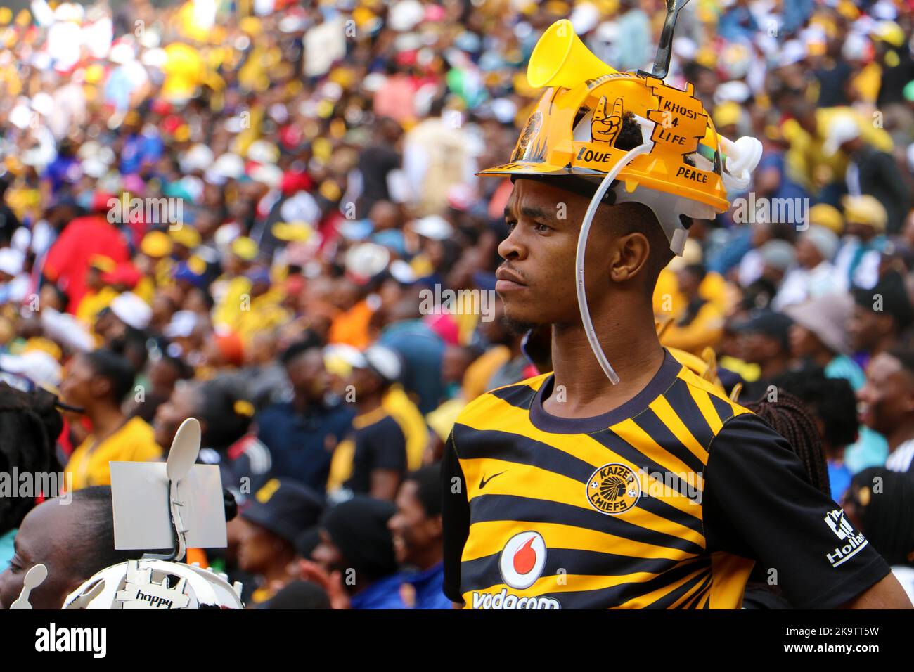 FNB Stadium, Soweto, Johannesburg, South Africa, 29 October 2022, Chiefs soccer fan wearing a makarapa at the Soweto Derby Stock Photo