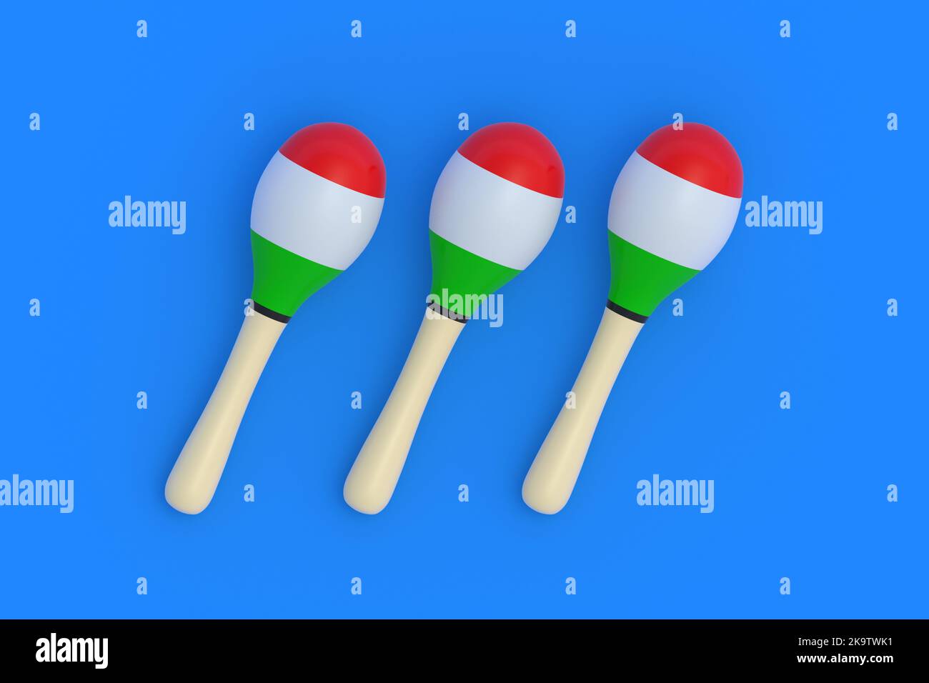Three mexican maracas on blue background. National musical instrument