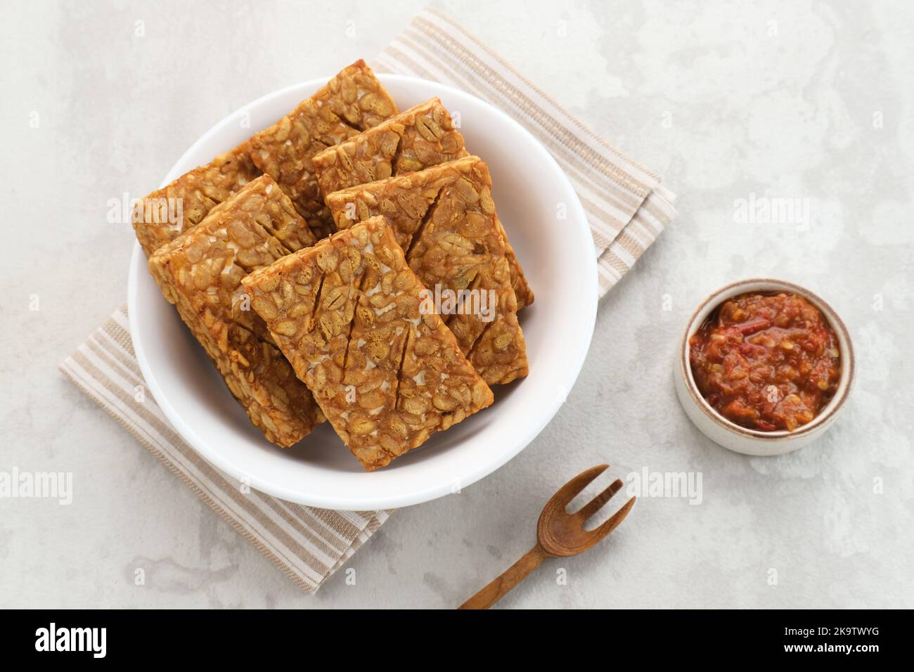 Tempeh, Tempe Goreng or Fried tempeh is Indonesia traditional food, made from fermented soybean