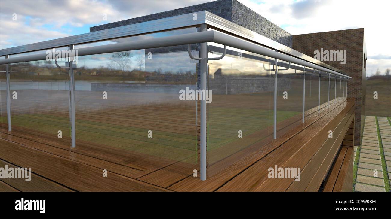 Fencing of the terrace of a modern private house, made of glass panels