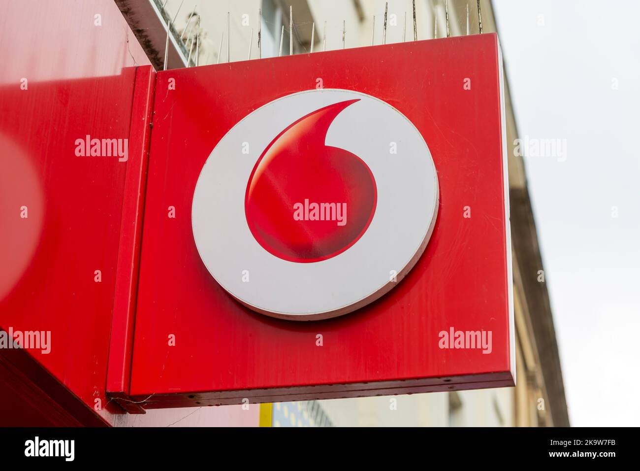 Shop store sign logo for Vodafone, Devizes, Wiltshire, England, UK