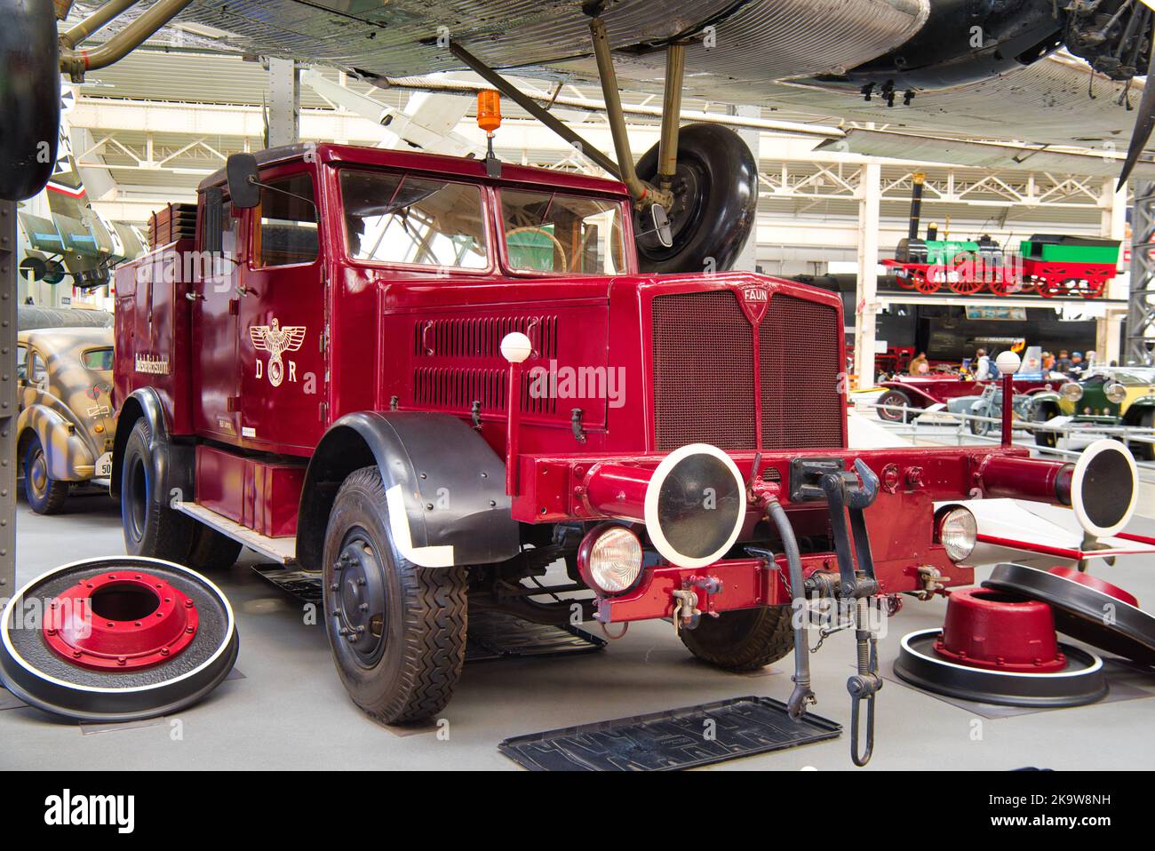 SPEYER, GERMANY - OCTOBER 2022: red FAUN ZUGMASCHINE TOWING VEHICLE 1940 retro truck in the Technikmuseum Speyer. Stock Photo