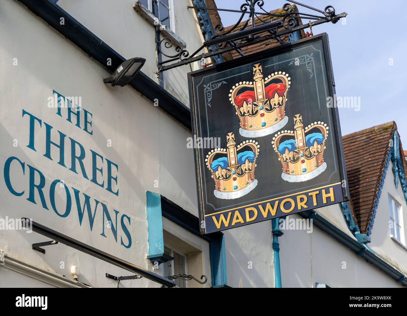 Pub sign for Wadworth brewery Three Crowns inn, Devizes, Wiltshire