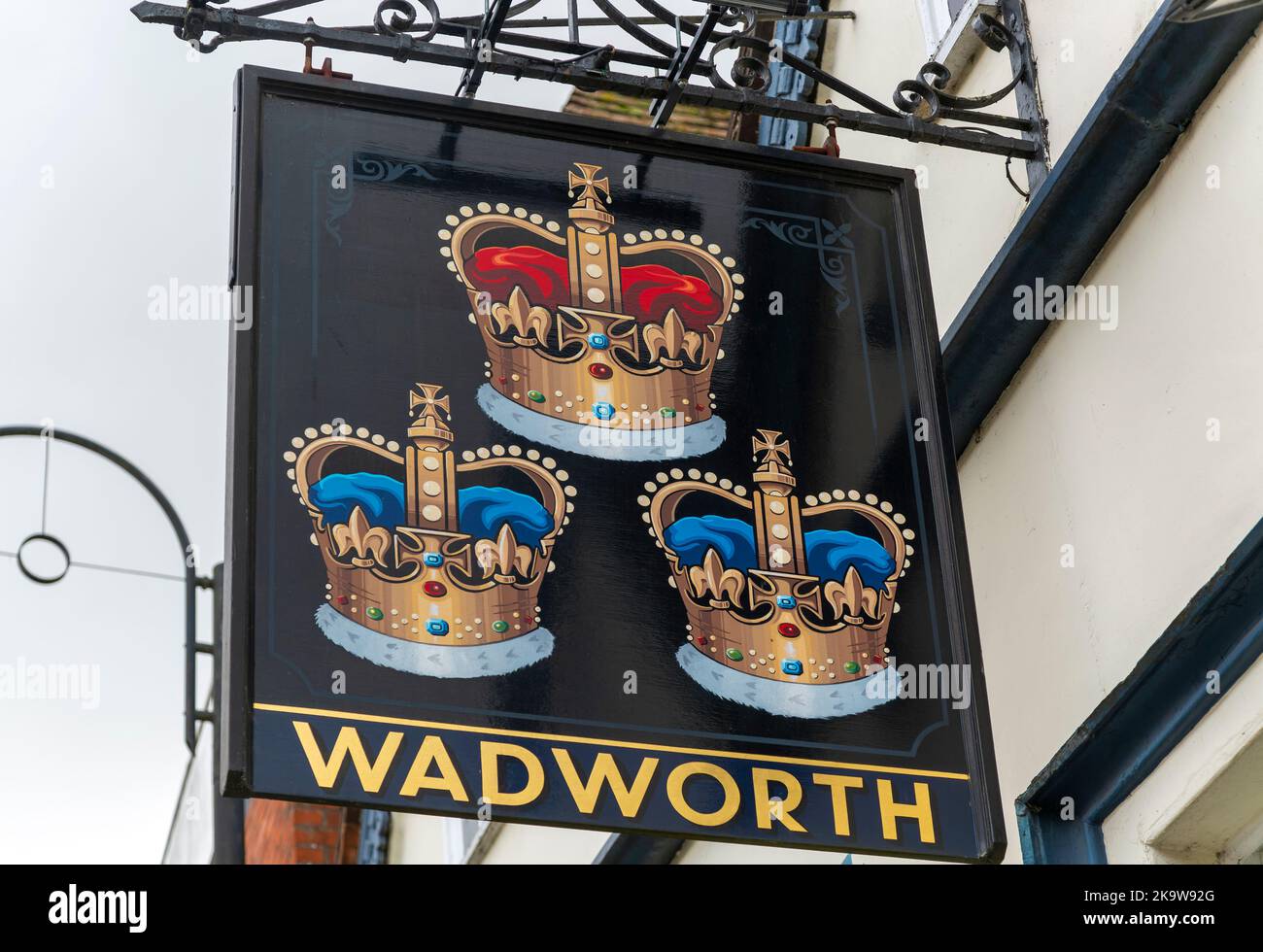 Pub sign for Wadworth brewery Three Crowns inn, Devizes, Wiltshire