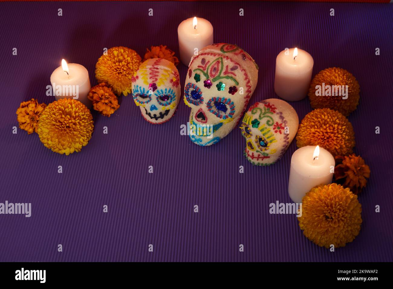 dia-de-los-muertos-day-of-the-dead-sugar-skull-with-candles-and
