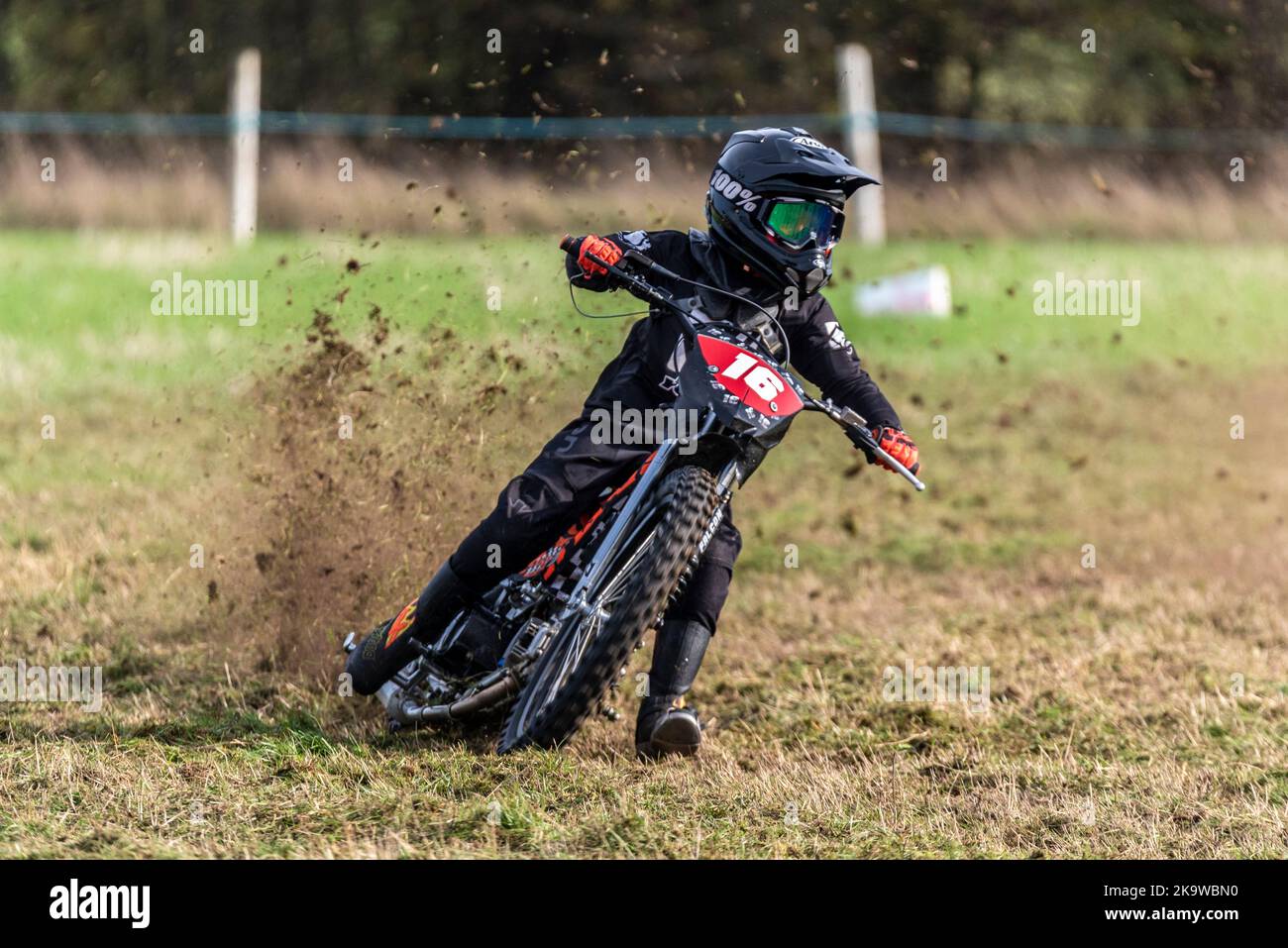 Finley Theobald racing in a grasstrack motorcycle race. Donut Meeting ...
