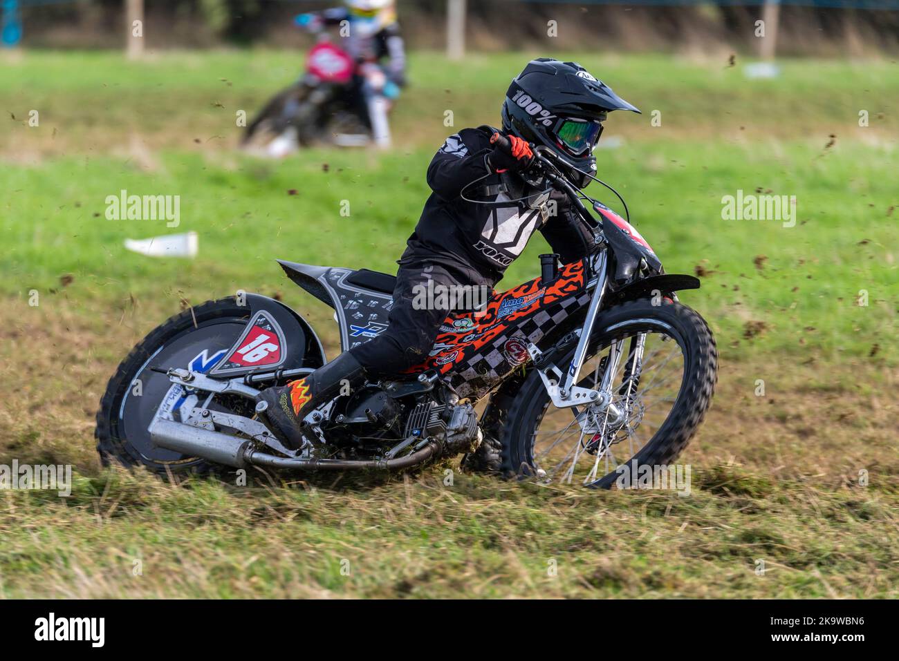 Finley Theobald racing in a grasstrack motorcycle race. Donut Meeting ...