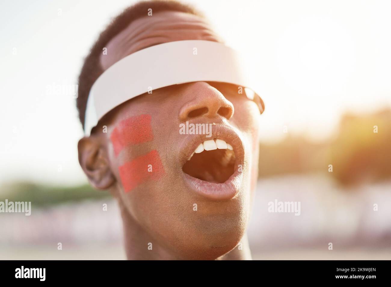 African red sport fan watching game using futuristic augmented reality