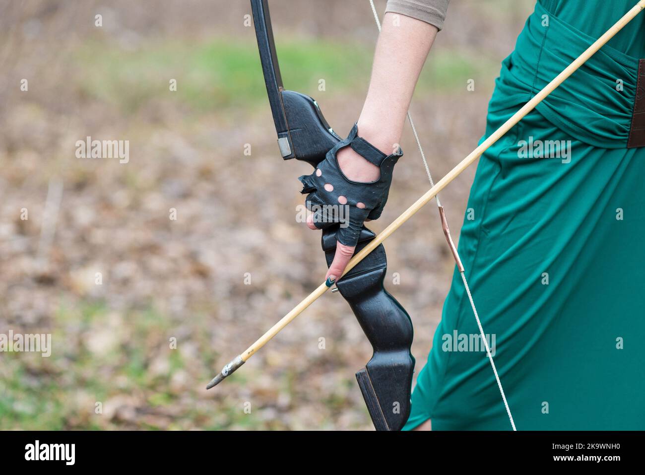 Young archer training with the bow real aged Stock Photo