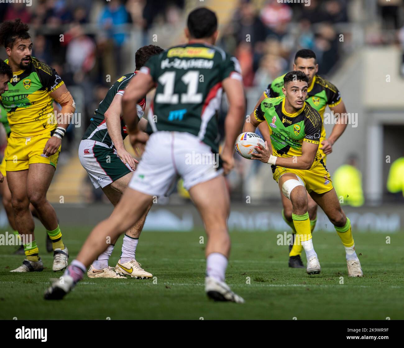 30th October 2022; Leigh Sports Village, Leigh, Greater Manchester, England Rugby League World Cup Lebanon versus Jamaica James Woodburn-Hall of Jamaica looks to pass the ball Credit Action Plus Sports Images/Alamy Live