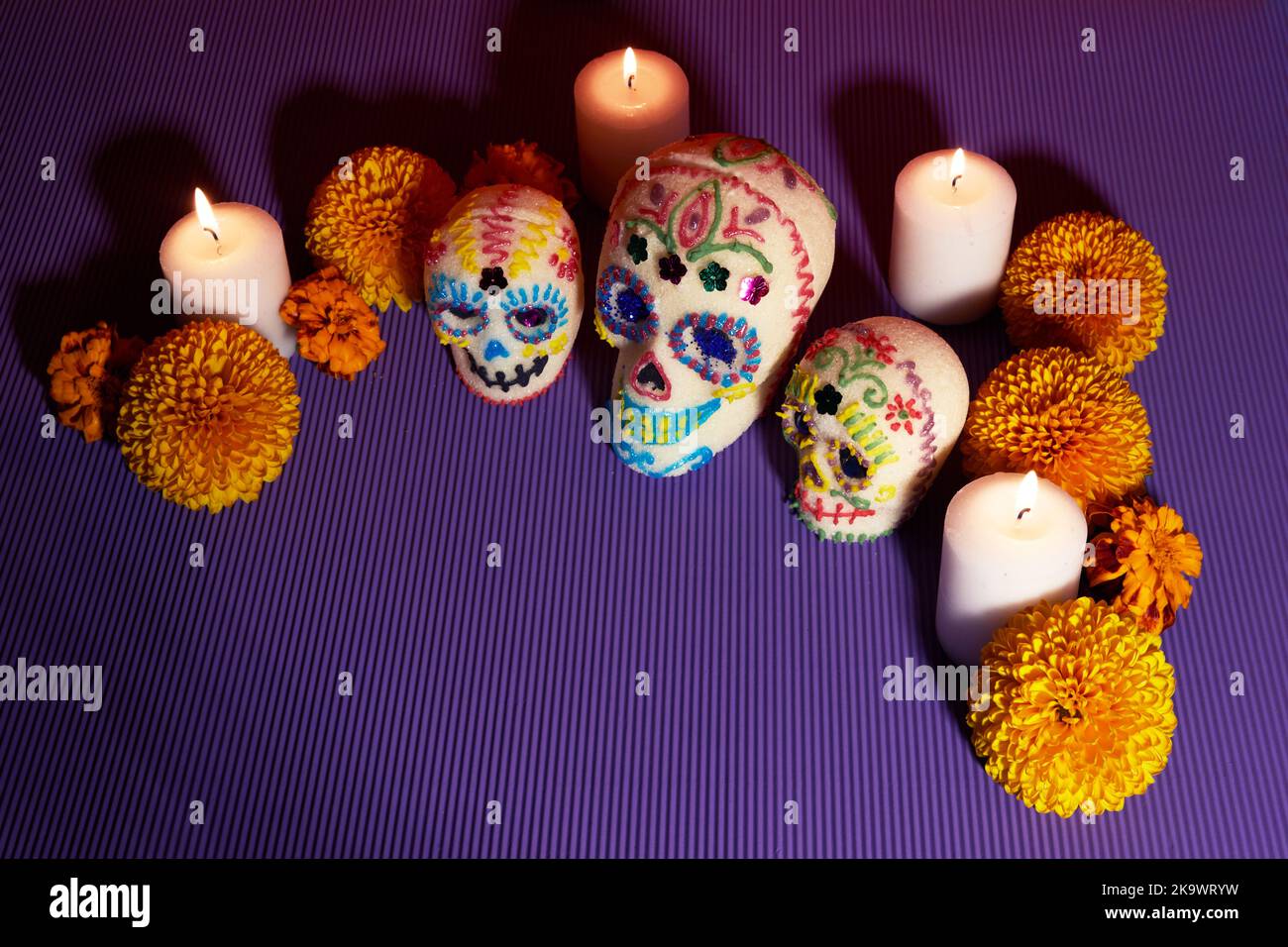 Dia de los muertos - Day of the dead Sugar skull with candles, and ...