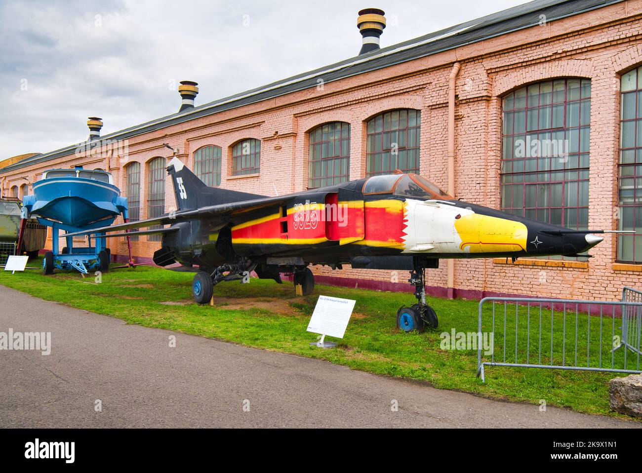 SPEYER, GERMANY - OCTOBER 2022: red yellow black Mikoyan-Gurevich MiG-23 Flogger 1967 a Soviet variable-geometry fighter aircraft in the Technikmuseum Stock Photo