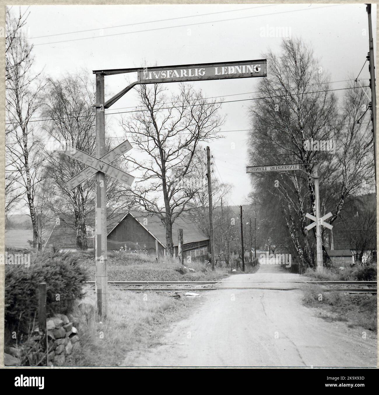 Railway crossing at Tvärskog, on the route between Finja and Tyringe. Stock Photo