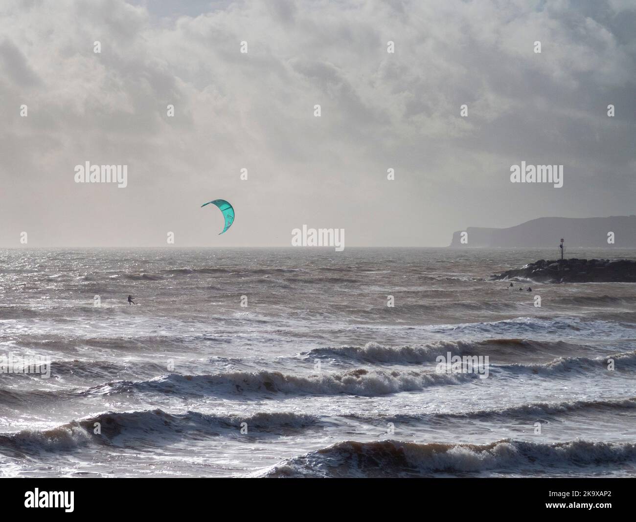 Sidmouth, Devon, 30th Oct 2022 Strong winds found excellent conditions for wind surfers at Sidmouth in Devon today. Tony Charnock/Alamy Live News Stock Photo
