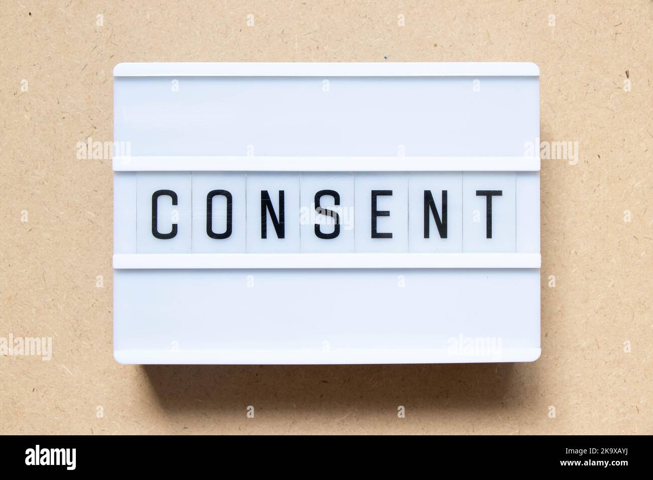 Lightbox with word consult on wood background Stock Photo