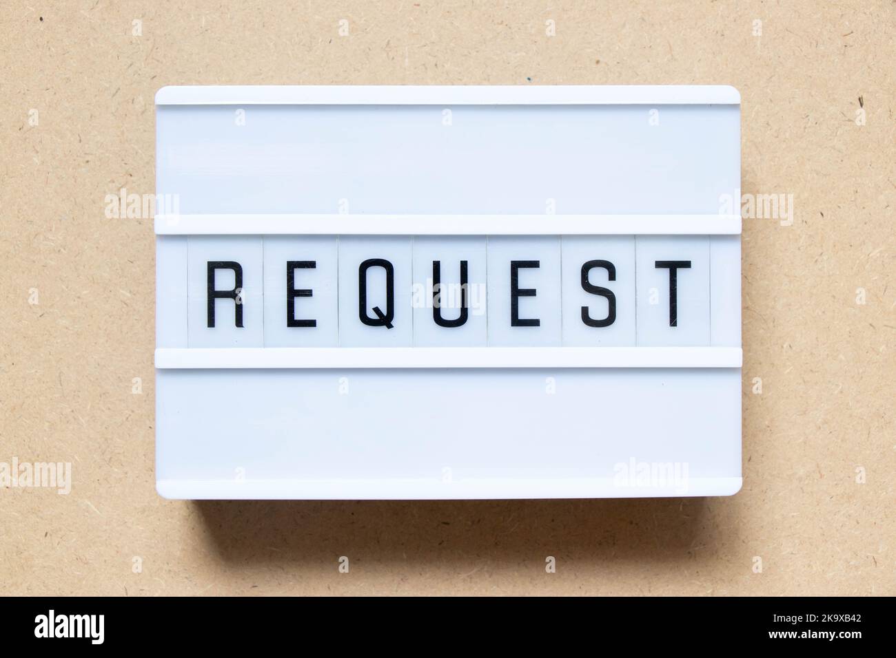 Lightbox with word request on wood background Stock Photo