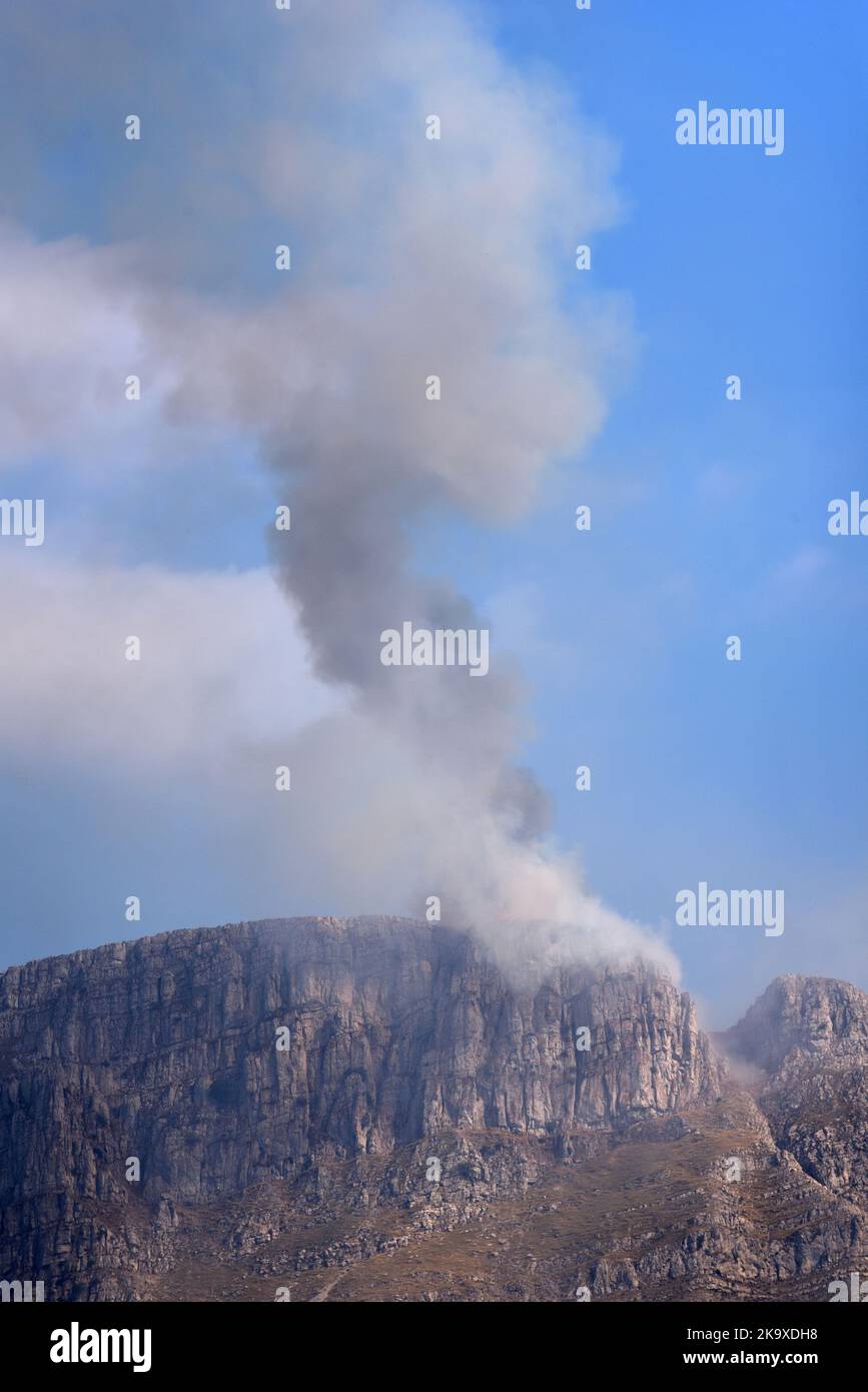 Smoke of Wild Fire, Bush Fire or Forest Fire Burning on Mountain Ridge of Les Traversières in the Verdon Lower Alps Alpes-de-Haute-Provence France Stock Photo