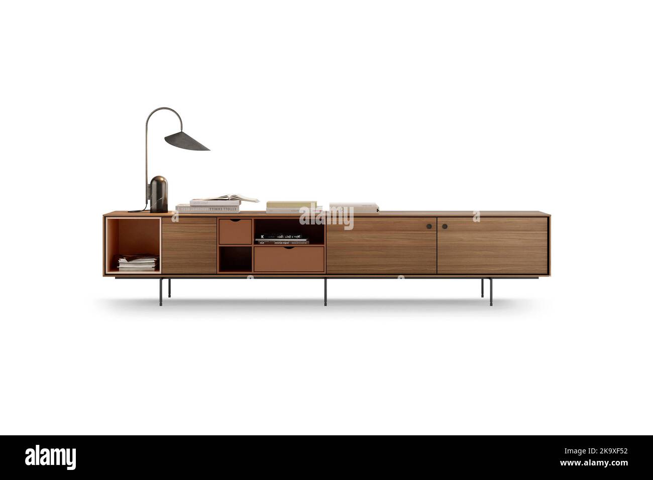 Wooden shelving unit with books and lamp isolated on white Stock Photo