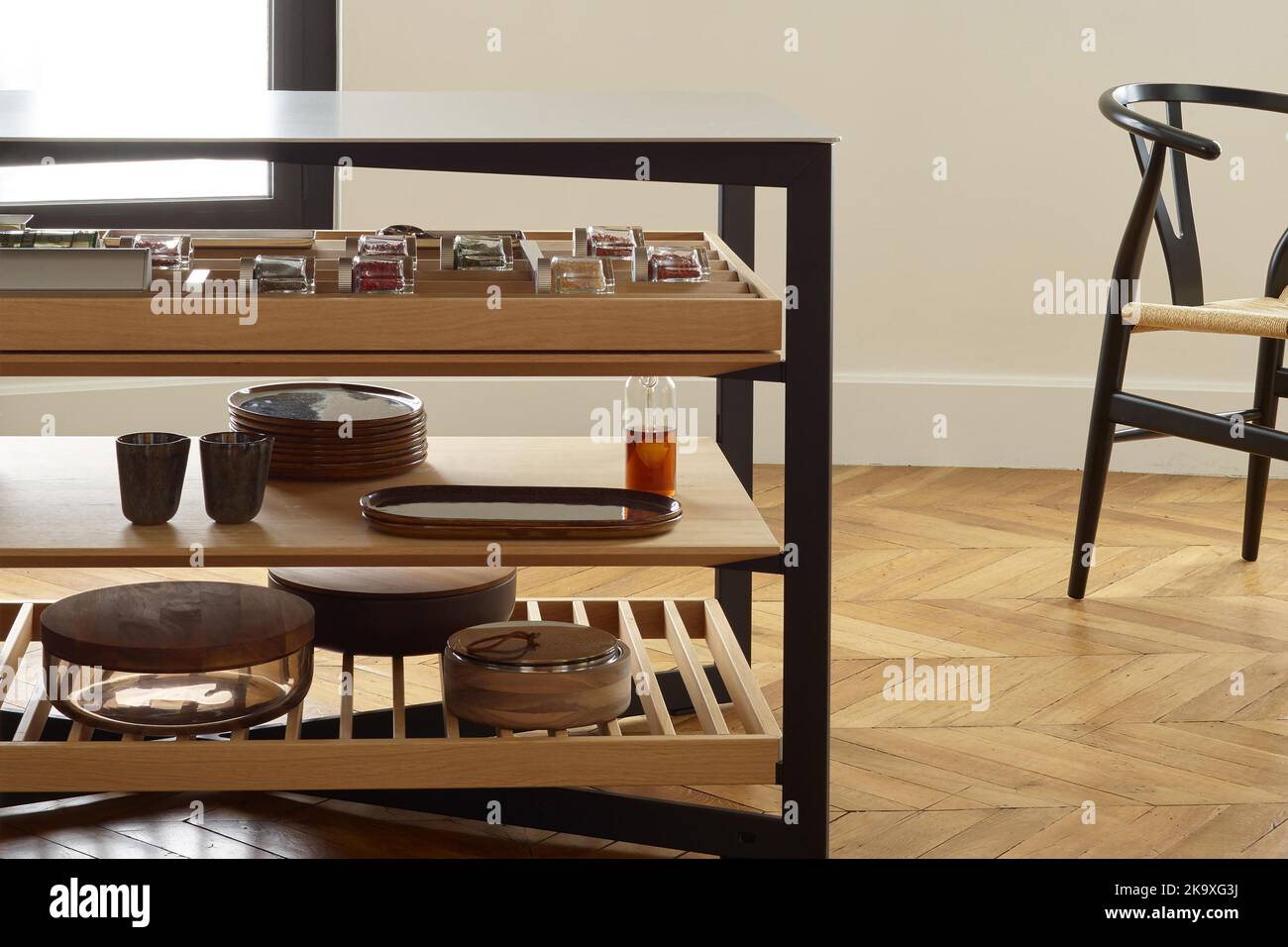 Wooden shelving unit with used tableware in kitchen interior Stock Photo Alamy