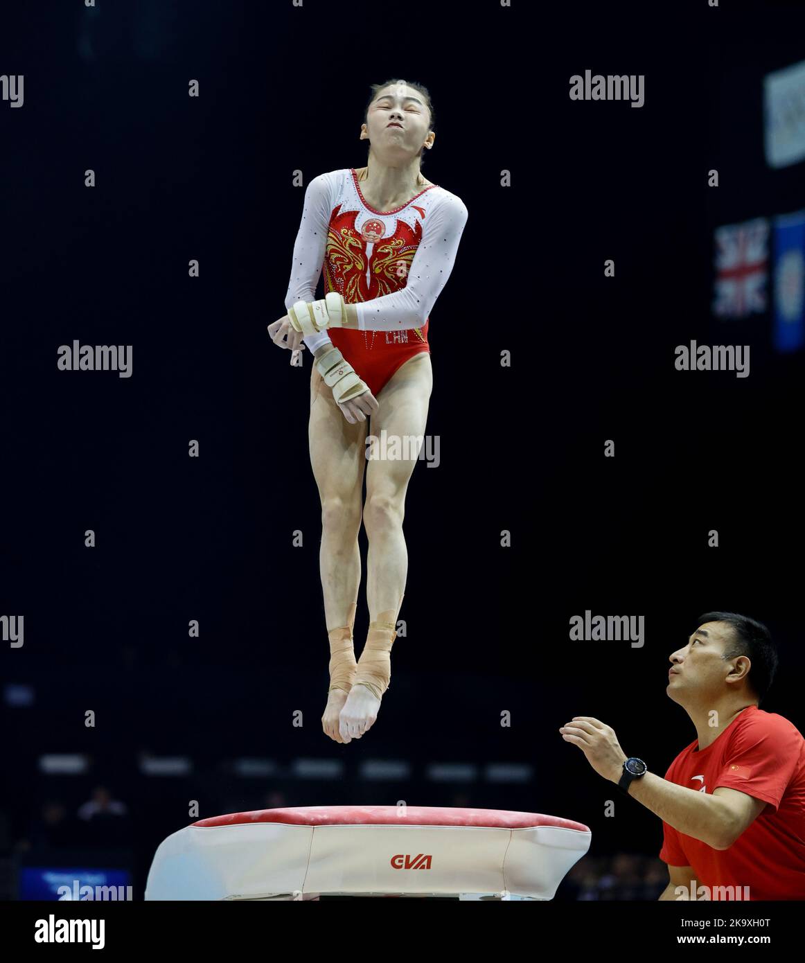 Liverpool, UK. 30th October 2022, M&amp;S Bank Arena, Liverpool, England; 2022 World Artistic Gymnastics Championships; Women's Qualification Vault - Xijing Tang (CHN) Tokyo 2020 Olympic balance beam silver medallist watched by coach Credit: Action Plus Sports Images/Alamy Live News Stock Photo