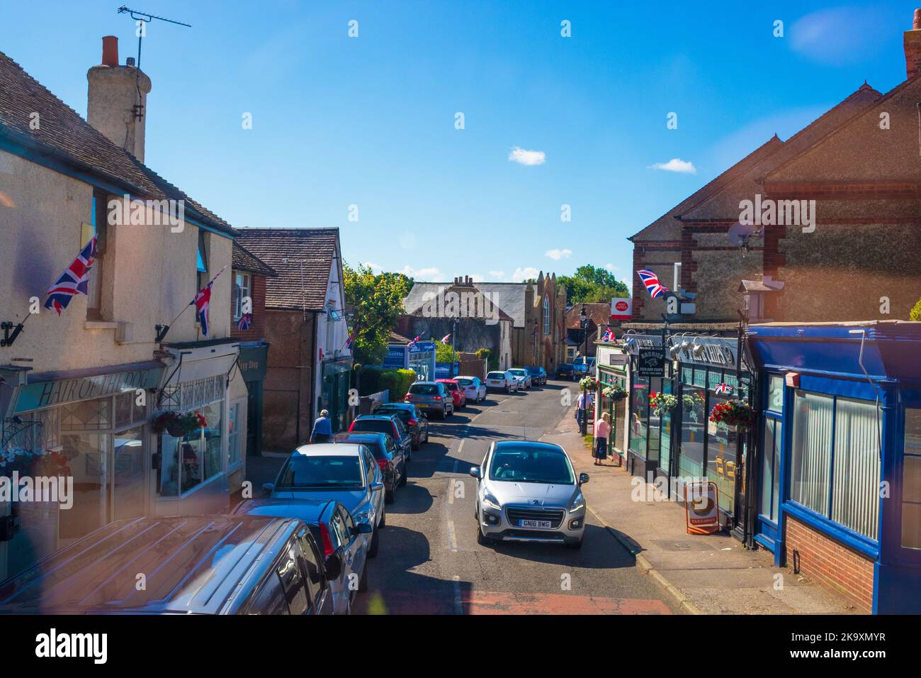 Minster, also known as is a village and civil parish in the District