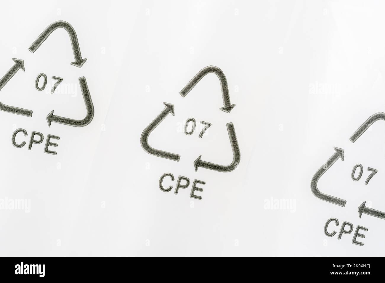 Closeup shot of 07 plastic resin code / Resin Identification Code 7 on plastic packaging. Here