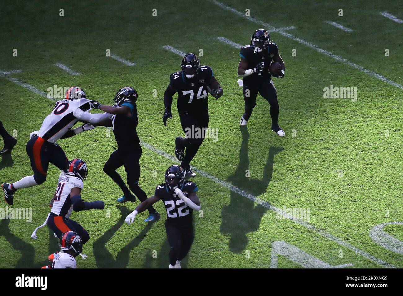Jacksonville Jaguars' Travis Etienne Jr. (right) during the NFL