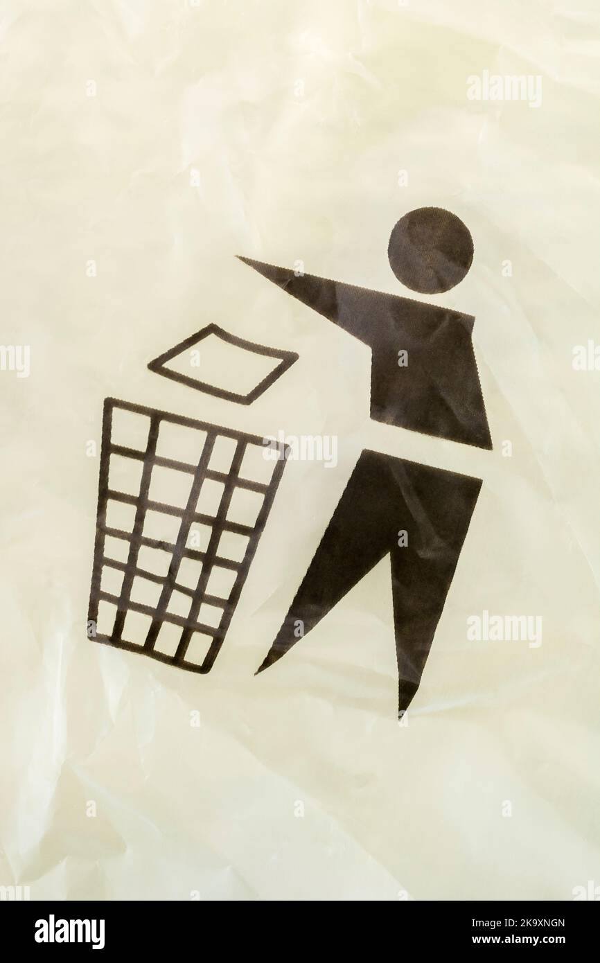 Recycling symbols - Tidyman pictogram - on plastic bag covering of a product box. International recycling symbols, recycling symbol, keep Britain tidy Stock Photo