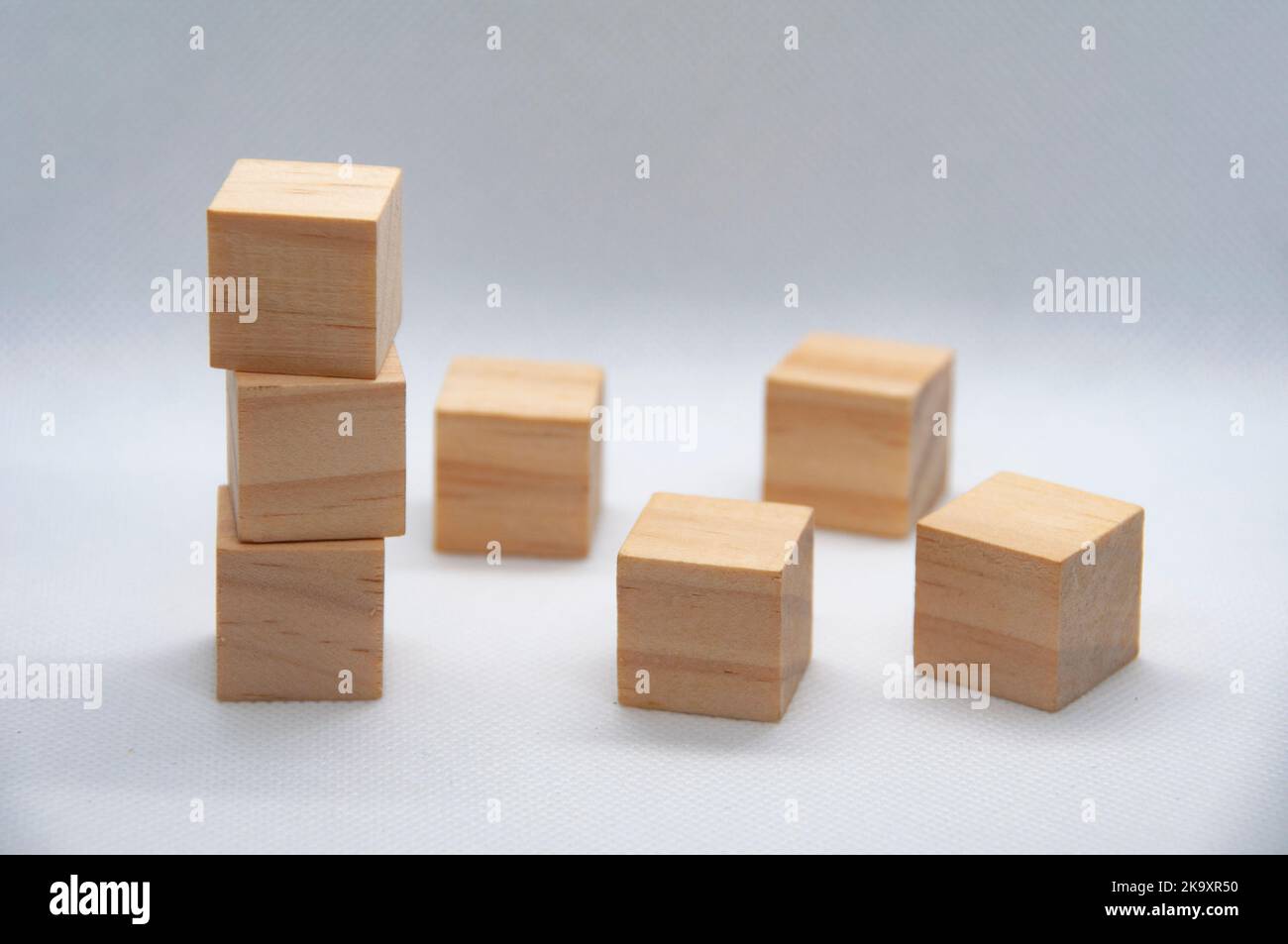 Blank wooden cubes on white background with customizable space for text